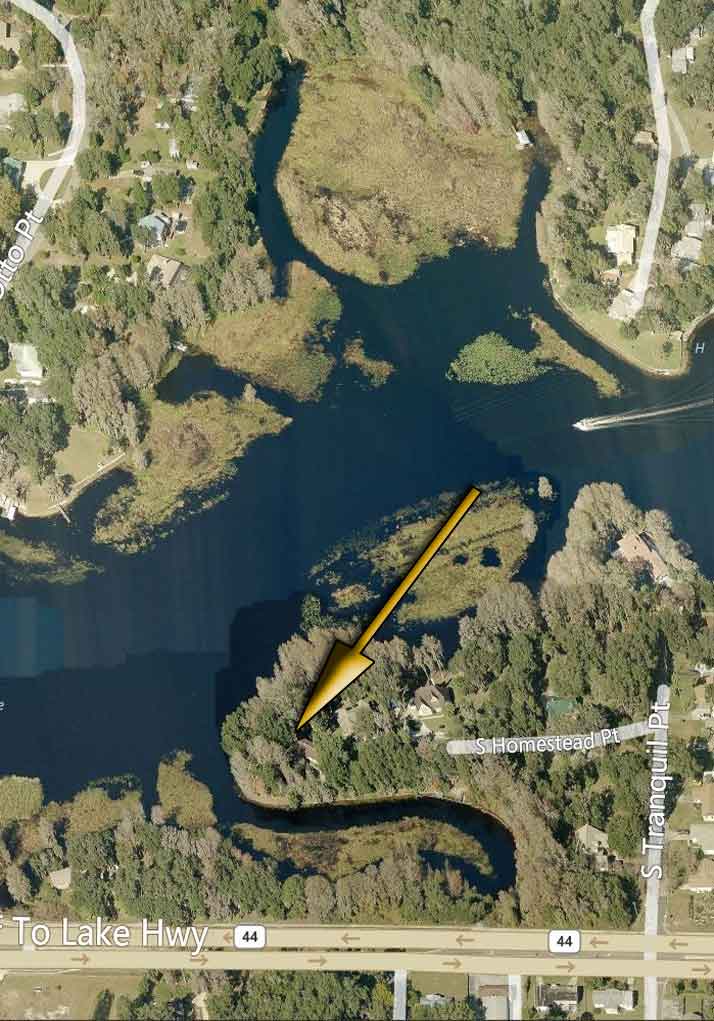 Aerial photo of the neighborhood of the waterfront pool home for sale in Inverness.